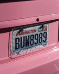“Keep On Dreaming” Clear License Plate Frame